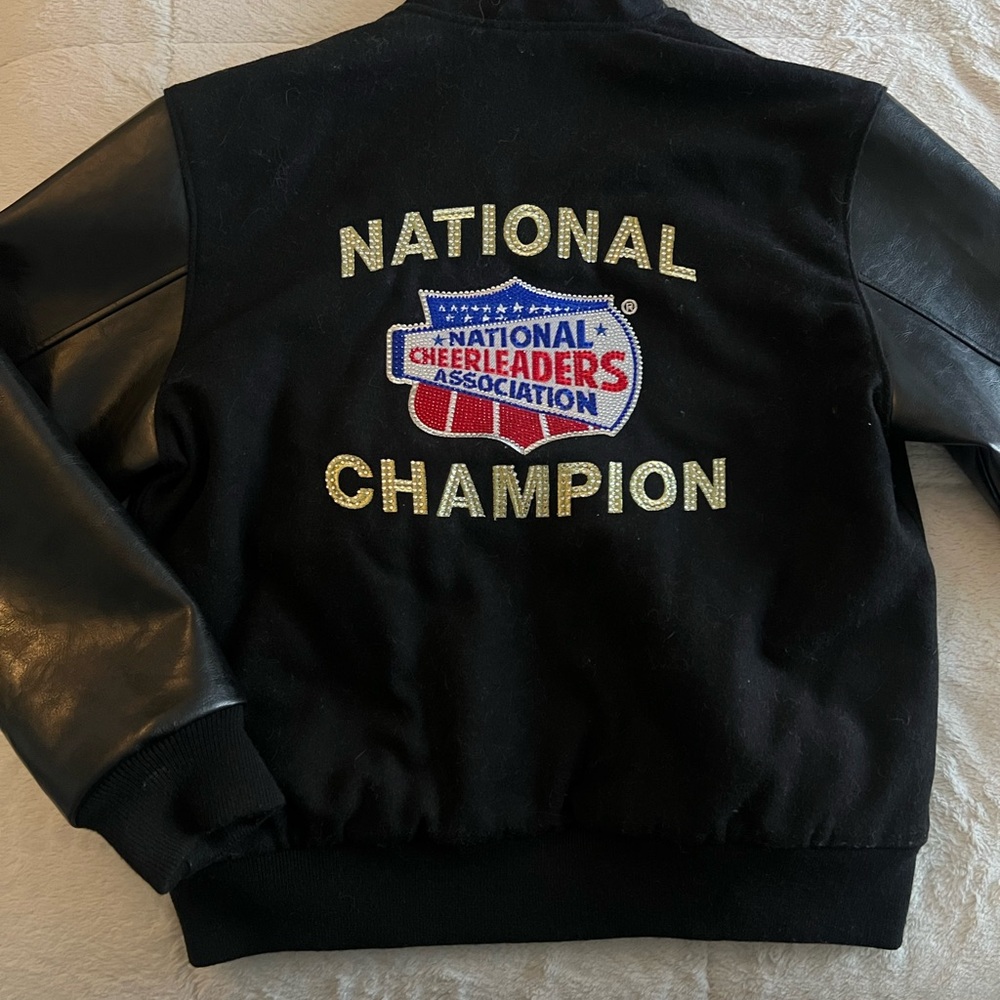 NCA Cheerleading National Champion  Jacket + Gold Metal
